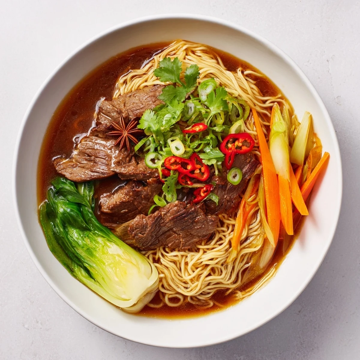 Close-up of savory Beef Noodles, showcasing the richness of the flavorful broth and inviting aroma.