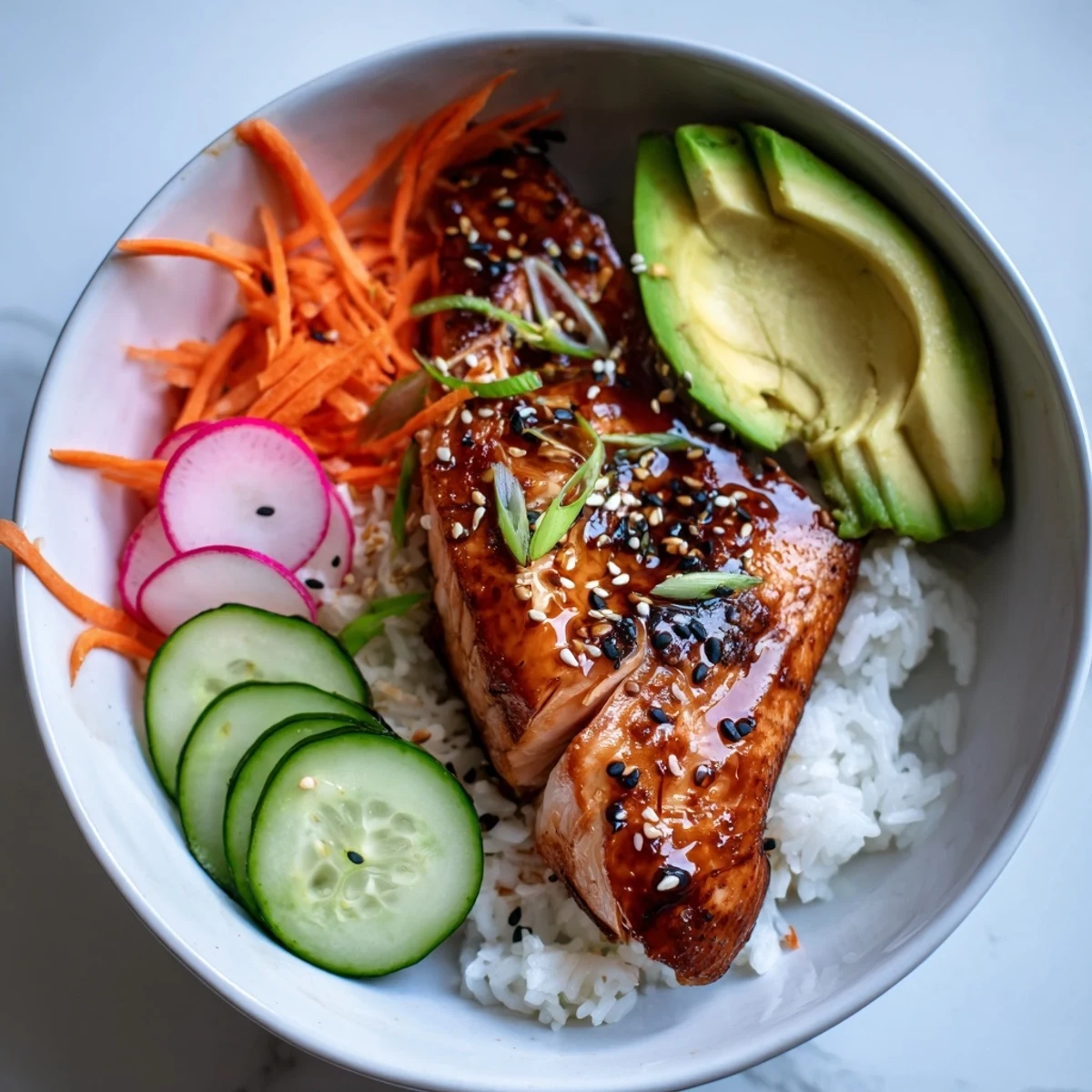 Flaky teriyaki-glazed salmon nestled in fluffy jasmine rice, topped with crunchy pickled veggies and sriracha mayo in a vibrant bowl.