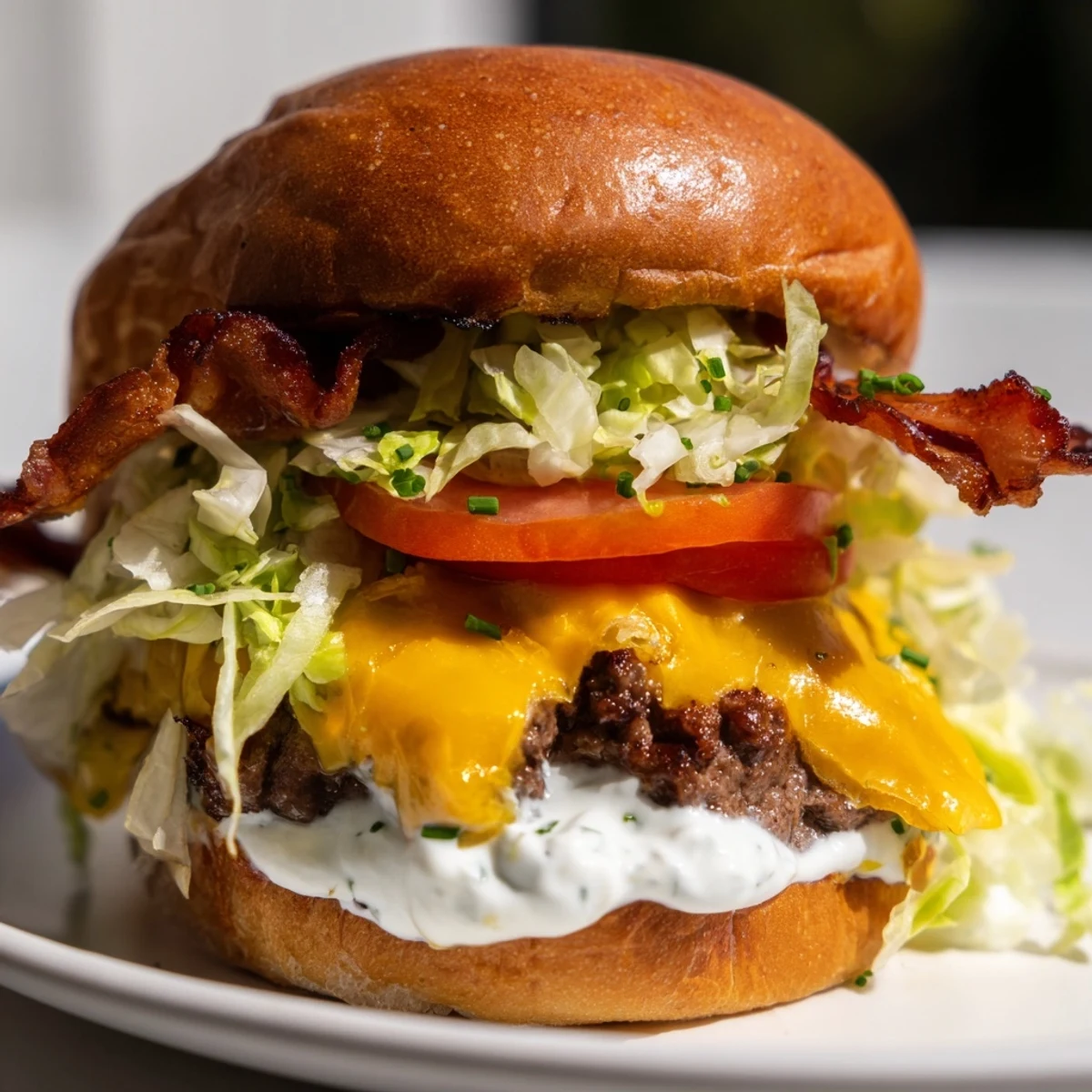 Golden beef Crack Burgers topped with sharp cheddar, crunchy bacon, fresh lettuce, tomato, and savory crack sauce