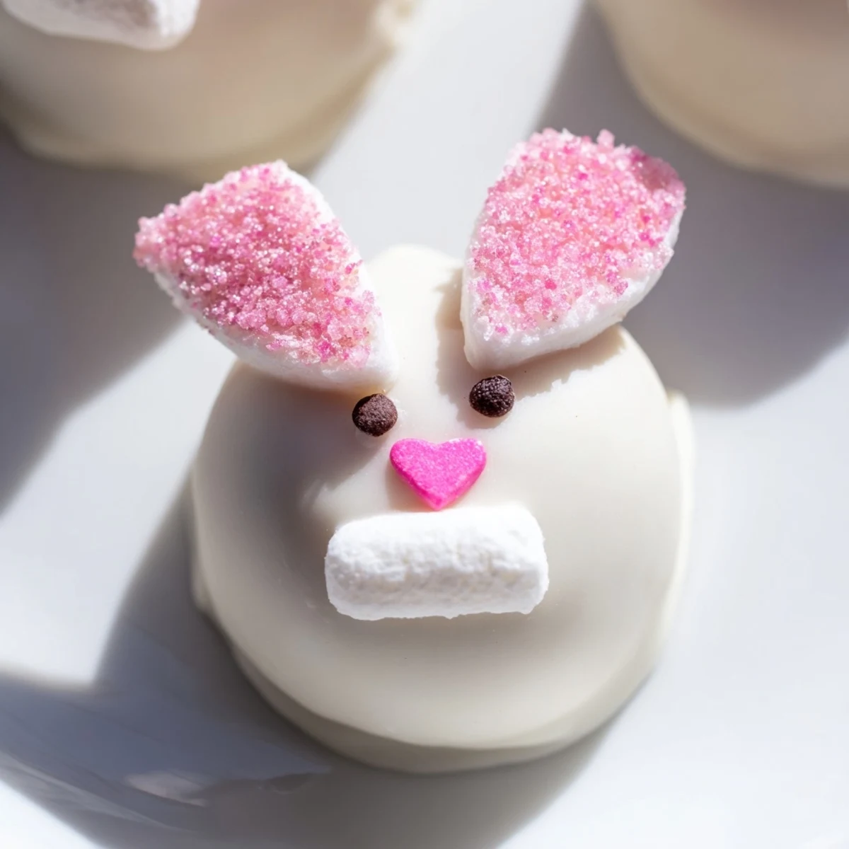 No-bake bunny Oreo balls featuring creamy chocolate truffles with marshmallow ears perfect for spring desserts