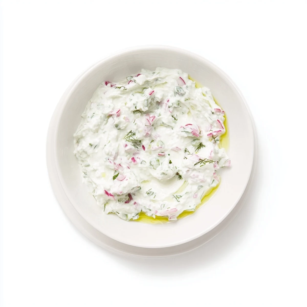 Thick and refreshing healthy radish tzatziki dip served with crisp vegetable crudités platter
