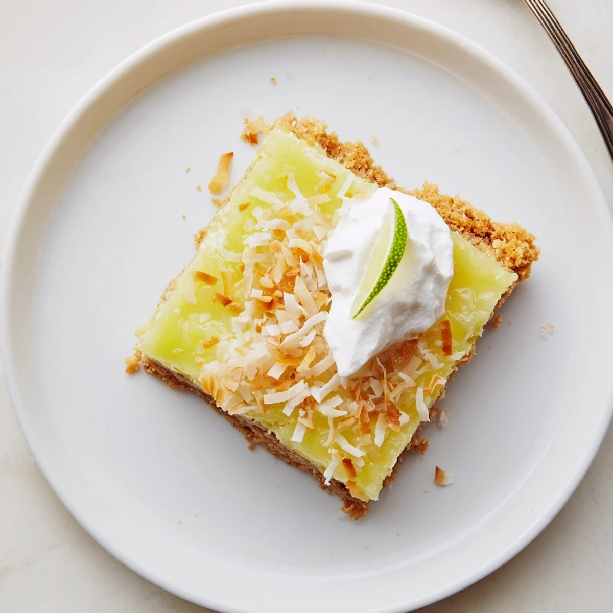 Bright, tangy aroma from chilled Tropical Chill Coconut Lime Bars with buttery crust
