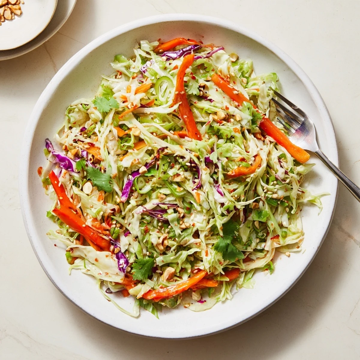 Asian Cabbage Salad with crunchy shredded cabbage, bright peppers, and toasted sesame seeds