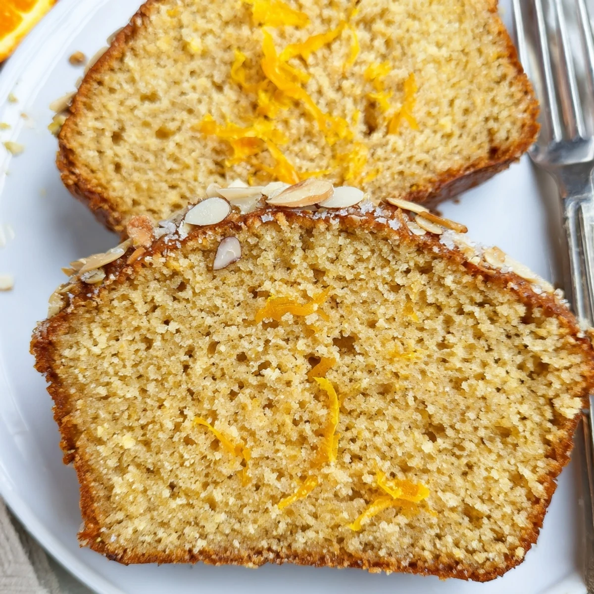 Morning slice of Gluten Free Orange Cardamom Bread with butter melting