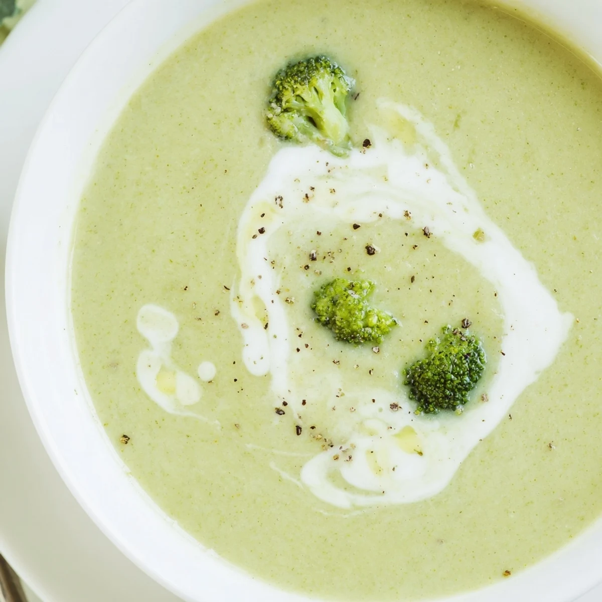 Bright green Broccoli Soup blended smooth, warm starter perfect for lunch.