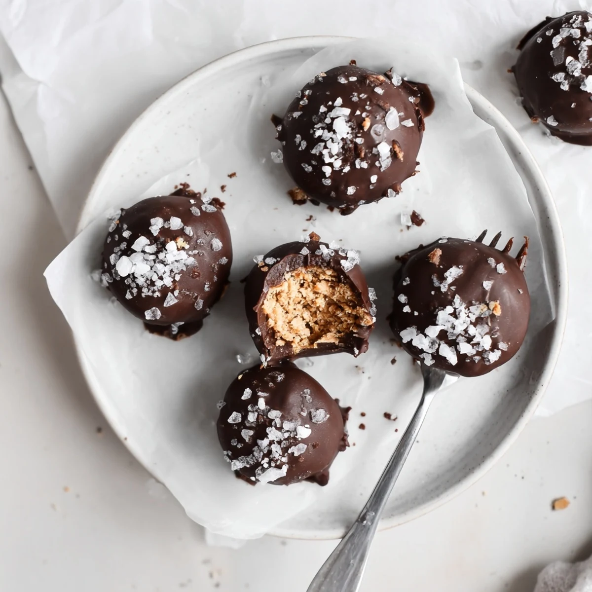 Frozen Peanut Butter Greek Yogurt Bites Dipped In Dark Chocolate With Sea Salt stacked