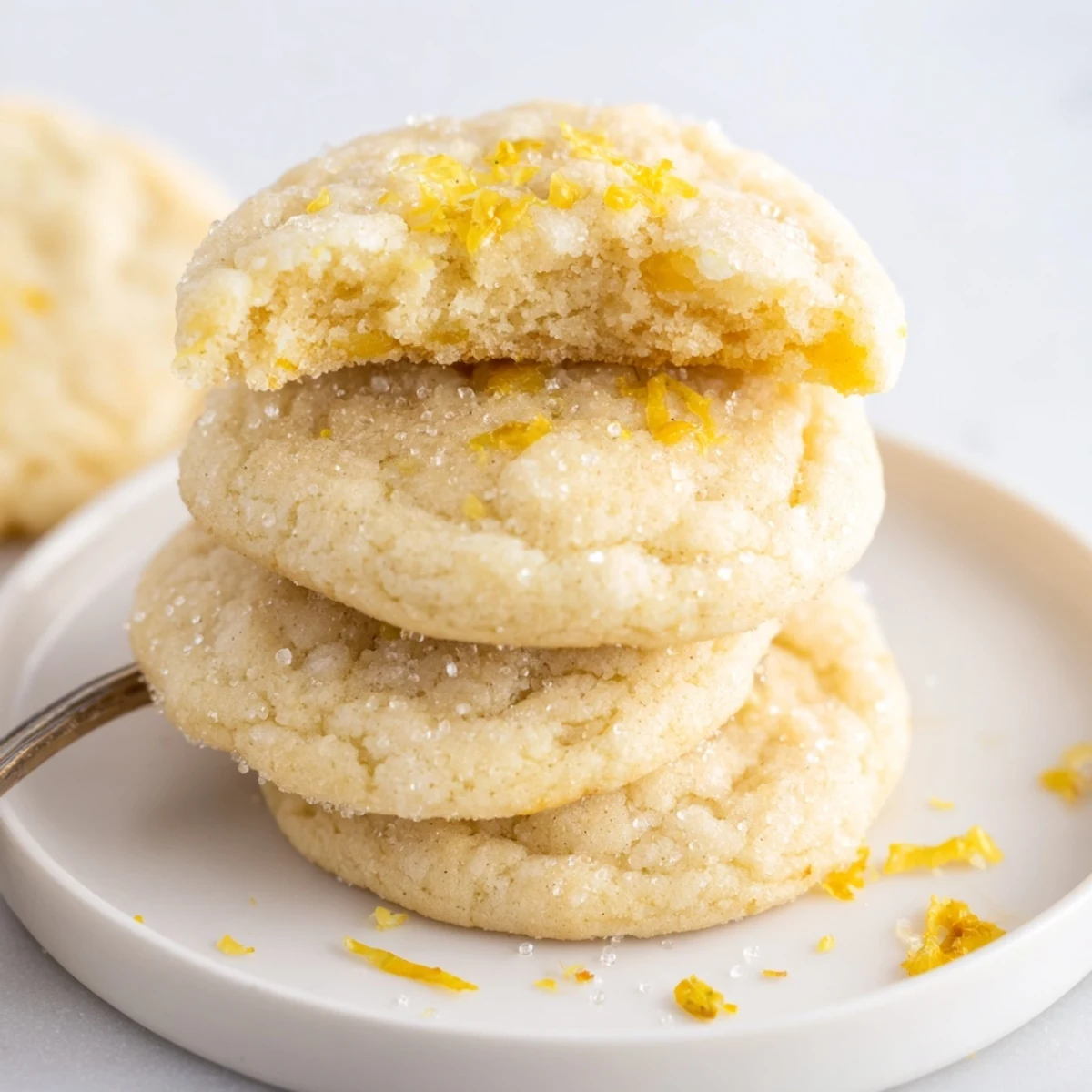 Warm Soft Chewy Lemon Cookies with sticky centers, bright lemon scent