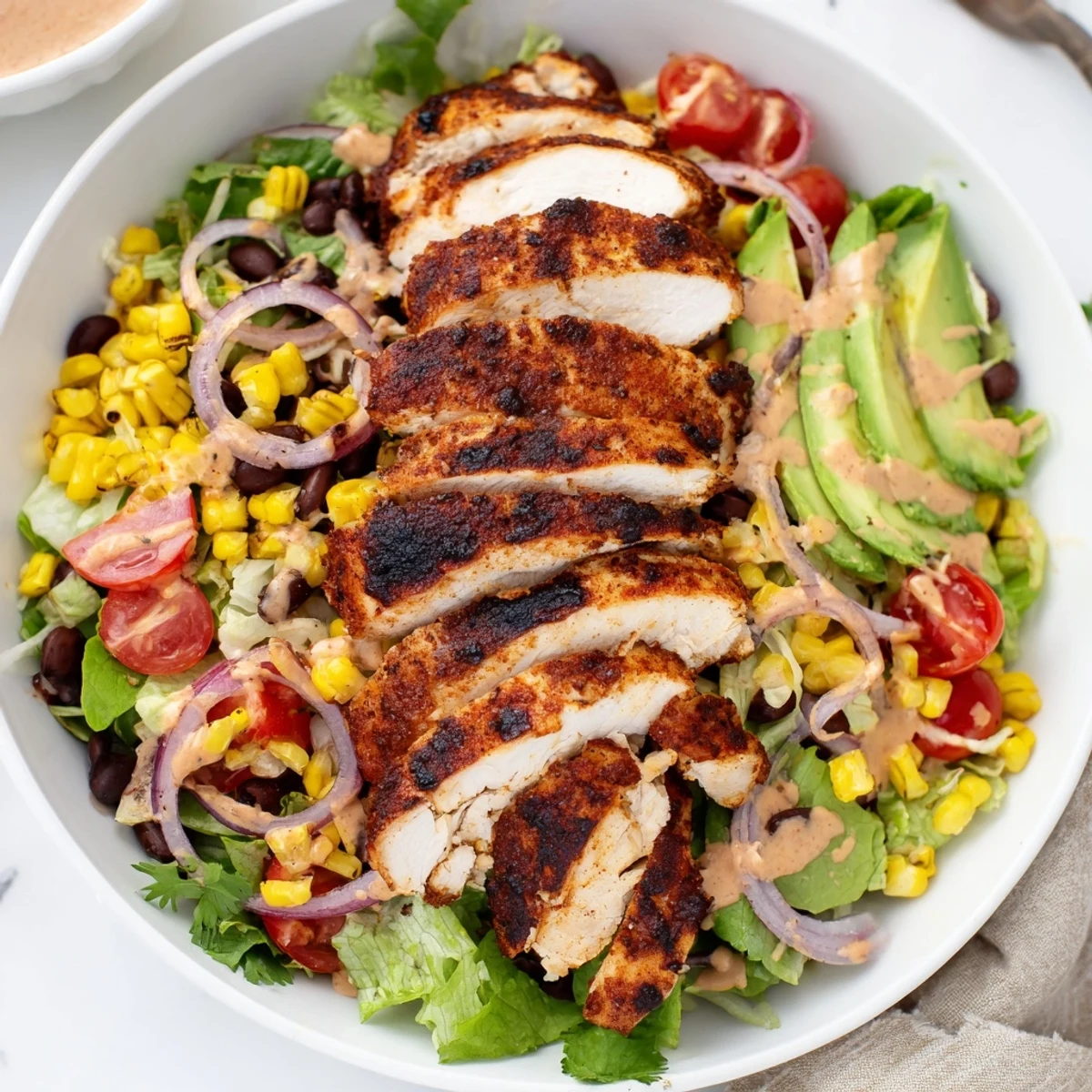 Southwestern Chicken Salad served with crispy tortilla strips and fresh cilantro