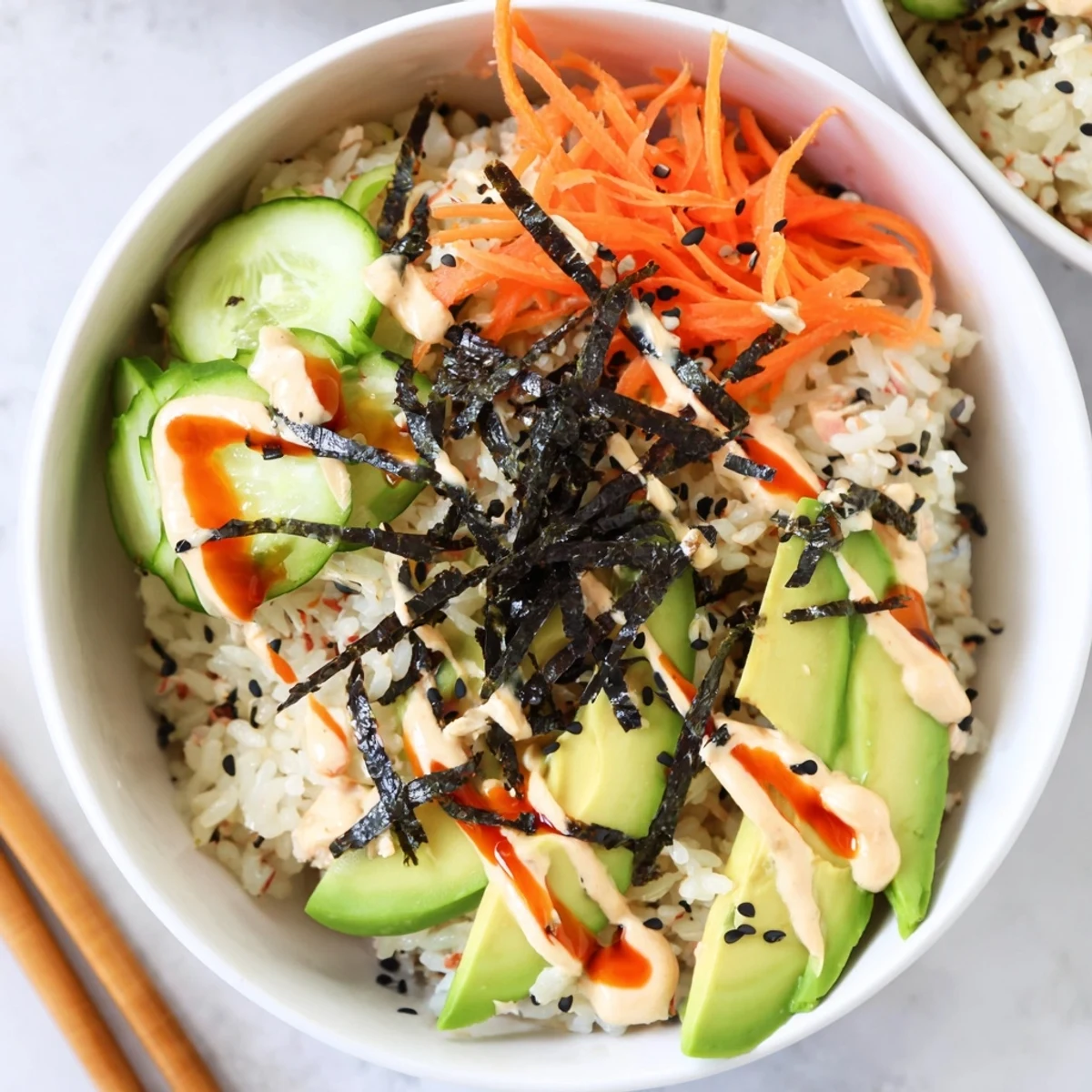 California Roll Sushi Bowls with creamy avocado, shredded crab, and sesame crunch.