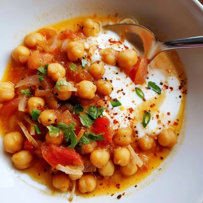 Hearty Greek Yogurt Chickpea Curry over basmati rice, aromatic spices rising.